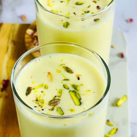 Make soft, sweet badam milk Oliga stuffed with chana dal and serve it with rich badam milk. Try this classic recipe today and treat your family!