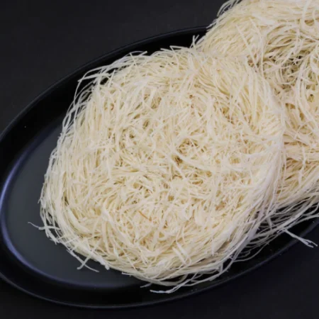 Cook creamy, soft Milk Peni in minutes for a perfect breakfast or dessert. Made from finest rice vermicelli. Order now and enjoy every bite!